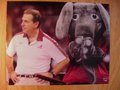 Picture: This is an original Alabama Crimson Tide 2011 BCS National Championship photo/poster of Nick Saban and the Alabama Elephant Mascot. What a contrast with Saban with his hands on his hips while the Elephant is happily clapping.