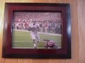 Picture: Amari Cooper touchdown original 8 X 10 photo as the Alabama Crimson Tide defeated Georgia 32-28 for the 2012 SEC Championship framed in cherry wood staircase molding to 11 X 14..