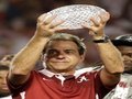 Picture: Nick Saban of the Alabama Crimson Tide holds the 2012 BCS National Champions Trophy as Bama wins its 15th National Championship.
