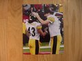 Picture: Ben Roethlisberger gives Troy Polamalu a comforting pat on the head for the Pittsburgh Steelers before a game original 8 X 10 photo. We are the exclusive copyright holders of this image.