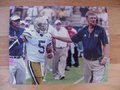 Picture: Paul Johnson and Justin Thomas confer in the Georgia Tech Yellow Jackets 42-38 win over Georgia Southern.