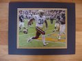 Picture: Deon Hill Georgia Tech Yellow Jackets original 8 X 10 photo of the winning 13-yard touchdown against Georgia Southern with 23 seconds left in the game professionally double matted in team colors to 11 X 14 so that it fits a standard frame!