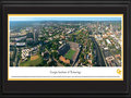 Picture: Georgia Tech Yellow Jackets Bobby Dodd Stadium 13.5 X 40 panoramic print professionally double matted in team colors and framed to 18 X 44. This aerial panorama of Georgia Institute of Technology, taken by George Pearl, spotlights Bobby Dodd Stadium at Historic Grant Field. Originally built in 1913 by the Georgia Tech student body, it is the oldest on-campus stadium in NCAA Division I-A. Known as Grant Field since 1914, the name Bobby Dodd Stadium was added in April 1988, in honor of the legendary coach. A stadium expansion was completed in 2003, raising capacity to 55,000 seats. The Yellow Jackets football team, which began in 1892, has won a total of 15 ACC titles, 4 national titles and has played in 35 bowl games. With more than 18,000 students, Georgia Tech occupies 400 acres in the heart of Atlanta.