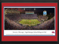 Picture: 2014 Ole Miss Rebels Vaught Hemingway Stadium 13.5 X 40 panoramic poster of this year's win over Tennessee professionally double matted in team colors and framed to 18 X 44. This panorama, taken by James Blakeway, features the Ole Miss Rebels hosting the Tennessee Volunteers, in front of a nationally televised game at Vaught Hemingway Stadium at Hollingsworth Field in Oxford, Mississippi. The University of Mississippi boasts a long and colorful football history, which includes the formation of the first football team in the state, as well as the winningest programs in the history of collegiate football. The beginnings of Rebel football can be traced back as far as 1890 and in 1893, a football team was organized. In 12 plus decades, Ole Miss has achieved an impressive record including numerous conference and national championship titles.