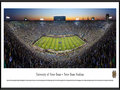 Picture: 2014 Notre Dame Fighting Irish Notre Dame Stadium panoramic poster of the 31-0 win over Michigan professionally framed. This panorama, taken by Christopher Gjevre, spotlights the Notre Dame Fightin’ Irish hosting the Michigan Wolverines in the much anticipated matchup between these two teams. Notre Dame celebrated a 31-0 victory in front of a sellout crowd of 80,795 fans. The shutout was the first in the series for the Irish, securing a 10-9-1 all-time record over the Wolverines in Notre Dame Stadium. The Notre Dame-Michigan series began on November 23 1887, Notre Dame's very first football game. After Notre Dame beat Michigan for the first time in 1909, the Wolverines refused to play the Irish on a regular basis until 1978. The game photographed here marked the last one to be played between the two teams.