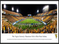 Picture: 2014 West Virginia Mountaineers Mountaineer Field at Milan Puskar Stadium panoramic poster professionally framed. This panorama was taken by James Blakeway. Since the facility opened in 1980, more than 11 million people have watched games at Mountaineer Field. Following a day of pregame festivities, more than 60,000 energized fans jam-packed the stadium, striping it in Old Gold and Blue based on their seat locations, while a national television audience tuned in to see WVU in its third season in the Big 12.