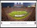 Picture: Auburn Tigers Jordan-Hare Stadium 2013 Iron Bowl win vs. Alabama on kickoff return game panoramic poster professionally framed. This panorama spotlights the Auburn Tigers making one of the touchdowns that clinched their spot in the SEC championship game, with a stunning victory over Alabama in the 2013 Iron Bowl. The game came down to the last play when the Tigers returned a missed field-goal attempt for more than 100 yards for a touchdown to lift No. 4 Auburn to a 34-28 victory over No. 1 Alabama. The Iron Bowl is the annual football rivalry played between the two largest public universities in the state of Alabama and this game was one of the most dramatic in the rivalry’s 78-year history, as the fans flooded the field in celebration. This panorama was taken by James Blakeway on November 30, 2013.