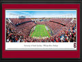 Picture: South Carolina Gamecocks Williams-Brice Stadium panoramic print professionally double matted in team colors and framed. This panorama, taken by James Blakeway, spotlights the South Carolina Gamecocks football team living up to their unique moniker with a victory over their opponent and finishing their first sweep of the SEC East. The Gamecocks were named in honor of Thomas Sumter, a South Carolina war hero who fought during the American Revolution. Sumter was given his name, "The Carolina Gamecock," for his fierce fighting tactics. South Carolina fielded its first football team in 1892, against Furman on Christmas Eve in Charleston. In 1992, the Gamecocks moved to the SEC and, in 2010, they won their first SEC Eastern Division Championship, the same year they defeated the #1 ranked team in the country.