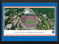 Picture: Florida Gators Ben Hill Griffin Stadium panoramic print professionally double matted in team colors and framed. This panorama of Ben Hill Griffin Stadium at Florida Field was taken by James Blakeway during a Florida Gators football game. Known as Florida Field for 59 years, in 1989 it was renamed in honor of citrus grower and major school supporter Ben Hill Griffin, Jr. Nicknamed "The Swamp", it holds over 88,000 seats. The stadium lives up to its haunting nickname with temperatures reaching a humid 100 degrees. The size and excitement of the fans concentrates the noise at field level, making it one of the loudest stadiums in America. It has been regularly ranked as one of the toughest places to play. The university, founded in 1853 in Gainesville, Florida, has over 51,000 students.