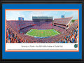 Picture: Florida Gators Ben Hill Griffin Stadium panoramic print professionally double matted in team colors and framed. This panorama, taken by James Blakeway, captures the victorious University of Florida Gators football team at Ben Hill Griffin Stadium at Florida Field. In 1989, the stadium was named in honor of citrus magnate Ben Hill Griffin, Jr., who was an alumnus and major benefactor of the University. Since its original construction in 1930, the Stadium has been renovated and expanded to its current seating capacity of 88,548 fans. It is the largest stadium in the state of Florida and one of the largest and loudest anywhere in the country. The Gators compete in the SEC Eastern Division and are one of twelve members of the SEC. Students at the University come from more than 130 countries and all 50 states.