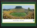 Picture: Oregon Ducks Autzen Stadium 13.5 X 40 panoramic poster professionally double matted in team colors and framed to 18 X 44. This panorama, taken by James Blakeway, provides testament to the best non-conference matchup of the year, as the No. 3 ranked Pac-12 Oregon Ducks played host to the No. 7 ranked Big Ten Michigan State Spartans at Autzen Stadium. The stage was set at this nationally televised event, when these two football programs took to the gridiron for an unforgettable matchup. At the closing whistle, with a roaring ovation from fans within college football’s loudest stadium, the Ducks had won the day