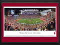 Picture: Washington State Cougars Martin Stadium 13.5 X 40 panoramic poster professionally double matted in team colors and framed to 18 X 44. This panorama, taken by James Simmons, showcases the Washington State Cougars football team playing to a packed house at Martin Stadium. The venue has undergone renovations, including a significant addition completed prior to the 2014 season. It resulted in a new Football Operations Building that houses a locker room, weight room, training area, dining facilities, coaches’ offices and team rooms. The year prior, a state-of-the-art video display and audio system was installed, along with premium seating and a media center in 2012, making this one of the premier venues in college athletics.