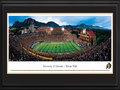 Picture: Colorado Buffaloes Folsom Field 13.5 X 40 panoramic poster professionally double matted in team colors and framed to 18 X 44. This panorama of Folsom Field, taken by Christopher Gjevre, features the stadium framed by the majestic Flatirons creating the perfect backdrop for the Colorado Buffaloes. Folsom Field, named after legendary University of Colorado Coach Frederick Folsom, opened in 1924 and has been home to the Buffaloes ever since. Nicknamed the "Buffs", the Colorado Buffaloes were National Champions in 1990, and Ralphie, the live buffalo mascot, leads the team onto the field before every game. Folsom Field is the third highest stadium in college football with an elevation of 5,440 feet above sea level and has a capacity of 53,750. The university was founded in 1876 in Boulder, Colorado, and enrollment now exceeds 28,000 students.