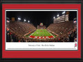 Picture: Utah Utes Rice-Eccles Stadium Blackout Game 13.5 X 40 panoramic poster professionally double matted in team colors and framed to 18 X 44. This panorama of Rice-Eccles Stadium, taken by Christopher Gjevre, captures the Utah Utes football team playing against Pac-12 Conference opponent, the USC Trojans. Seizing the importance of this game, Utah football asked fans to wear black as part of the team’s annual Blackout game dating back to the 2008 Sugar Bowl winning season when Utah hosted TCU. Utah and USC first competed against one another in football on November 20, 1915, at Cummings Field in Salt Lake City. The Utes and Trojans have met multiple times since that first game, including the 1993 Freedom Bowl and the 2001 Las Vegas Bowl, which the Utes won 10-6.