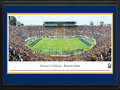 Picture: California Golden Bears Memorial Stadium 13.5 X 40 panoramic poster professionally double matted in team colors and framed to 18 X 44. This panorama, taken by Christopher Gjevre, brings to focus the on-field action of the University of California Golden Bears football team playing their first regular season game in the $321 million newly renovated California Memorial Stadium, also known as Memorial Stadium. Since its opening in 1923, Memorial Stadium has treated fans of all ages to many of the greatest games in the history of Cal football. Today, the Stadium is retrofitted for the 21st century, with fan safety in mind, while maintaining the architecture and character of the historic structure. State-of-the-art video and ribbon boards complete the modernization of the Stadium by greeting fans as they arrive and greatly enhancing their in-game experience.