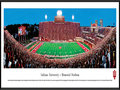 Picture: Indiana Hoosiers Memorial Stadium 13.5 X 40 panoramic poster professionally framed.This panorama of Memorial Stadium, taken by Christopher Gjevre, highlights the action of an Indiana Hoosiers football game. Memorial Stadium, located in Bloomington, Indiana, opened in 1960. It replaced the "old" Memorial Stadium, a 20,000 seat stadium built in 1925. After many renovations, seating capacity now holds 52,692. The Hoosiers football program began in 1887 and competes in the Big Ten Conference. Established in 1820 as the Indiana State Seminary, eight years later the name was changed to Indiana College and officially changed to Indiana University in 1838. Indiana University enrolls 107,000 plus students at all IU campuses.