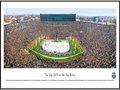 Picture: Michigan Wolverines vs. Michigan State Spartans Michigan Stadium 13 X 40 panoramic print professionally framed to 13.75 X 40.25. This panorama, taken by James Blakeway, captures the college ice hockey game between long-time rivals – the University of Michigan and Michigan State University. The match-up, known as "The Big Chill at the Big House," was held at Michigan Stadium on December 11, 2010. The event set a new world record for the largest crowd at an outdoor ice hockey game with attendance of 113,411. The past record set in May 2010, at the International Ice Hockey Federation (IIHF) World Championship game, was 77,803. This is the second outdoor ice hockey game to be played between the two storied programs. The first game, also a resounding success, occurred in 2001 and was referred to as the "Cold War."