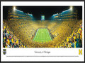 Picture: Michigan Wolverines Michigan Stadium 13.5 X 40 panoramic print professionally framed. This panorama, taken by James Blakeway, captures a historical moment as the Michigan Wolverines played their first night game at the Big House on September 10, 2011. The event set a new Michigan Stadium and NCAA attendance record with a crowd of 114,804 fans. To further celebrate the occasion, the team wore ‘legacy' uniforms highlighting design elements from past eras, including a large ‘M' on the front of the jersey and numbers on the sides of the helmet. In the 39th meeting between the schools, Michigan defeated Notre Dame 35-31 with the final touchdown recorded in the last seconds of the game. Michigan now holds a 23-15-1 advantage in the classic rivalry.