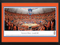 Picture: Illinois Fighting Illini Assembly Hall 13 X 40 panoramic print professionally double matted in team colors and framed to 18 X 44. This panorama, taken by Christopher Gjevre, captures the on-court action of the Fighting Illini basketball team as they play for a victory over North Carolina in the ACC/Big Ten Challenge game. The Fighting Illini men's and women's basketball teams play their home games at Assembly Hall in Champaign, Illinois. Assembly Hall has earned a reputation as one of the toughest places to play in college basketball, thanks to the student cheering section, the "Orange Krush." The University of Illinois at Urbana–Champaign is a public research university, situated on 1,468 acres in the twin cities of Champaign and Urbana, with annual student enrollment of over 41,000 students.