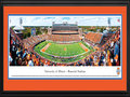 Picture: Illinois Fighting Illini Memorial Stadium 13 X 40 panoramic print professionally double matted in team colors and framed to 18 X 44. This panorama, taken by James Blakeway, features the Fighting Illini football team playing on home turf at Memorial Stadium. This Homecoming Game and Big Ten season opener is also the battle for the "Land of Lincoln" rivalry trophy, which is presented to the winner of the annual football game between Illinois and Northwestern University. Homecoming at the University of Illinois is the longest continuously running tradition of its kind. The Homecoming tradition has been celebrated on the Illinois campus for more than 100 years, since the inaugural event in 1910. In its first Homecoming game, Illinois beat the University of Chicago, 3-0. The University was established in 1867.