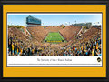 Picture: Iowa Hawkeyes Kinnick Stadium 13 X 40 panoramic print professionally double matted in team colors and framed to 18 X 44. This panorama, photographed by James Blakeway, spotlights the Iowa Hawkeyes football team playing a Big 10 Conference rival for a win and possession of the Floyd of Rosedale bronze pig trophy. One of the most famous trophies in all of college football, Floyd of Rosedale dates back to 1935, when Minnesota-Iowa governors agreed to award their state's prize pig to the winner of the football game. This game also marked the opening of the conference season in Iowa City and, the first time since 1979 that Iowa hosted Minnesota on Homecoming. Founded in 1847, The University of Iowa is the largest university in the state, with more than 30,000 students, but the smallest public institution in the Big Ten.