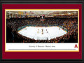 Picture: Minnesota Golden Gophers Mariucci Arena 13 X 40 panoramic print professionally double matted in team colors and framed to 18 X 44. This panorama of Mariucci Arena on the University of Minnesota campus, photographed by James Blakeway, features the Minnesota Golden Gopher hockey team playing WCHA rival University of Minnesota-Duluth. Mariucci Arena is named in honor of long time hockey coach John Mariucci, who was also a standout hockey and football player for the Gophers. Mariucci coached the Gophers from 1952 to 1966 with the exception of the 1955-1956 season. Dedicated in 1993, Mariucci Arena has a hockey game capacity of 10,000. University of Minnesota Hockey enjoys a long history, becoming a varsity sport in 1921. The Golden Gophers have won five national championships in men's hockey.