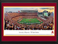 Picture: Minnesota Golden Gophers TCF Bank Stadium 13 X 40 panoramic print professionally double matted in team colors and framed to 18 X 44. This panorama, photographed by Robert Pettit, captures the Minnesota Golden Gophers football team playing their first game at their beautiful new on-campus home - TCF Bank Stadium. The inaugural game was held on September 12, 2009. The Gophers were victorious against the United States Air Force Academy with a final score of 20 to 13. TCF Bank Stadium was built in a "horseshoe" design with incredible views of the Minneapolis skyline. The stadium, which seats 50,805, combines architectural elements from historic Memorial Stadium with the modern amenities of today's athletic venues. The Golden Gophers football team began play in 1882 and has won six national championships.