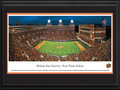 Picture: Oklahoma State Cowboys Boone Pickens Stadium 13 X 40 panoramic print professionally double matted in team colors and framed to 18 X 44. This panorama, taken by James Blakeway, captures the fans cheering as their beloved Oklahoma State Cowboys crush the undefeated Baylor Bears at Boone Pickens Stadium. This evening was a test for both highly ranked teams and one of the nation’s biggest showdowns. In the end, the Cowboys won with a victorious final score of 49-17. OSU fans showed their support with a long-standing tradition of rising to their feet, waving one arm, while singing The Waving Song, “Oklahoma State! Oklahoma State! We'll sing your praise tonight!” Oklahoma State football boasts one of the nation’s top football powers, with a rich bowl history that includes many of the most prestigious games in college football.