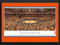 Picture: Syracuse Orange Carrier Dome 13 X 40 panoramic print professionally double matted in team colors and framed to 18 X 44. This panorama, taken by Christopher Gjevre, spotlights the Syracuse Orange playing at the Carrier Dome in a colossal showdown against the Duke Blue Devils. The epic affair featured a thrilling overtime finish in which Syracuse emerged victorious 91-89 and rose to #1 in the nation with the win. The two legendary coaches - Jim Boeheim and Duke's Mike Krzyzewski called it one of the greatest games of all time. The game marked the official tip-off of the Syracuse/Duke rivalry in the ACC. The spectacular event broke the on-campus college basketball attendance record set the prior year, with 35,446 fans packing the largest domed stadium in college sports.