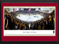 Picture: Boston College Eagles Conte Forum 13 X 40 panoramic print professionally double matted in team colors and framed to 18 X 44. This panorama, taken by Christopher Gjevre, spotlights the excitement at Conte Forum/Kelley Rink as the Boston College Eagles men's hockey team plays for a win against the Notre Dame Fighting Irish. With the victory, the Eagles captured the coveted Snooks Kelley – Lefty Smith Trophy, awarded the winner between the Boston College – Notre Dame hockey classic. Boston College is among the top college hockey programs in the country and has established itself as a perennial powerhouse in both regular season and post-season play. Boston College was established in 1863 and is located in Chestnut Hill, Massachusetts.