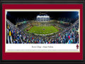 Picture: Boston College Eagles Alumni Stadium 13 X 40 panoramic print professionally double matted in team colors and framed to 18 X 44. This panorama of Alumni Stadium, taken by Christopher Gjevre, captures the action of a Boston College Eagles football game. The roots of Alumni Stadium and on-campus football at Boston College date back to 1915. Years later, after playing at two off-campus sites, the current stadium was built on Boston College's lower campus and opened in 1957. Renovations took place in 1971 and 1998, bringing seating capacity to its current 44,500. The Eagles football team, a member of the Atlantic Coast Conference, began play in 1892 and is consistently ranked among the nation's best for academic achievement and graduation. Boston College was established in 1863 and is located in Chestnut Hill, Massachusetts.