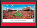 Picture: Louisville Cardinals Papa John's Cardinal Stadium 13 X 40 panoramic print professionally double matted in team colors and framed to 18 X 44. This panorama, taken at the newly remodeled Papa John's Cardinal Stadium by Christopher Gjevre, features the University of Louisville football team playing to a capacity crowd. The $72-million stadium expansion, completed in 2010, increased seating capacity from 42,000 to 55,000 and added 33 suites. The University claims that Papa John's Cardinal Stadium is the only stadium owned and operated by a United States university with all-chairback seating; there are no bleachers in the stadium. Founded in 1798, the University was the first city-owned public university in the United States and currently enrolls over 22,000 students annually.