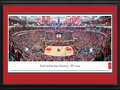 Picture: North Carolina State Wolfpack PNC Arena 13 X 40 panoramic print professionally double matted in team colors and framed to 18 X 44. This panorama, taken by Christopher Gjevre, spotlights an exciting night of men's basketball as the North Carolina State University Wolfpack play for a win against rival, the University of North Carolina Tar Heels, at PNC Arena. Formerly known as the RBC Center, the $158-million PNC Arena opened in 1999, serves as a multi-use home to the North Carolina State University men's basketball program and seats 19,722 fans. The Wolfpack basketball program began in 1911 and continues to have a successful winning history. The action and excitement of ACC basketball in North Carolina is a way of life, with friendly rivalries among Triangle Universities, UNC Chapel Hill and Duke.