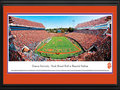 Picture: Clemson Tigers Frank Howard Field at Memorial Stadium 13 X 40 panoramic print professionally double matted in team colors and framed to 18 X 44. This panorama, taken by Robert Pettit, features the Clemson Tigers football team playing on their home turf for another win at Frank Howard Field at Memorial Stadium. On the same day Clemson honored the 1981 National Championship football team at Death Valley, the Tigers tied one of its records for points in a quarter with 35 in the third quarter, and also eclipsed 50 points in the game for a second-straight week. The Tigers were established in 1897 and achieved their first undefeated season in 1900. Clemson University is located in the foothills of the Appalachian Mountains on the shores of Lake Hartwell and enrolls over 19,450 graduate and undergraduate students on an annual basis.