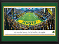 Picture: North Dakota State Bison Gate City Bank Field at the Fargodome 13 X 40 panoramic print professionally double matted in team colors and framed to 18 X 44. This panorama, taken by James Blakeway, captures a sea of gold as the top-ranked North Dakota State Bison take on Georgia Southern in the battle for a coveted slot in the Division I Football Championship Subdivision title game. This evening's "Gold Rush" game was the third meeting and the third thrilling victory for the Bison over the Eagles, with a final score of NDSU 23, Georgia Southern 20. The Bison's on-field success has translated into impassioned fan support, attracting more than 100,000 fans a year and ranking NDSU in the top-10 nationally in the FCS. Fielding their first season in 1894, the Bison play their home games on the artificial turf of Gate City Bank Field at the Fargodome.