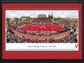 Picture: Eastern Washington Eagles Roos Field 13 X 40 panoramic print professionally double matted in team colors and framed to 18 X 44. You may know the blue turf, but now you can see the red turf! This panorama, taken by Christopher Gjevre, captures the action of the Eastern Washington University football team playing its inaugural game on its new red Sprinturf surface at newly re-named Roos Field (formerly Woodward Field). The opponent for the Eagles on this historic day on September 18, 2010, was its Big Sky Conference rival, the University of Montana Grizzlies. The Eagles broke a 27-all tie with a field goal with four seconds remaining, then iced the victory on the final play of the game with a 34-yard fumble return for a touchdown. The final score of 36-27 will go down as one of the greatest victories in school history. Established in 1882, the University's main campus is located in Cheney, Washington.