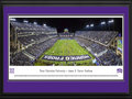 Picture: 2014 TCU Horned Frogs Amon G. Carter Stadium 13.5 X 40 panoramic print professionally double matted in team colors and framed to 18 X 44 of the team's win over Kansas State. This panorama, taken by Christopher Gjevre, spotlights the TCU Horned Frogs playing at Amon G. Carter Stadium in a colossal showdown against Big 12 opponent, the K-State Wildcats, at a game with both teams ranked in the Top 10. Tradition runs deep in the Big 12 conference, and TCU is no exception where traditions start with the Horned Frog. Some say the horned frog was chosen, due to the small, spiny lizards prevalence on the football practice field, yet others say it’s tough feisty spirit matched the tough frontier spirit shown by TCU itself. Regardless of the reason, the TCU student athletes take pride in being called Horned Frogs.