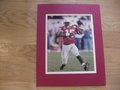 Picture: Tommie Frazier Nebraska Cornhuskers original 8 X 10 photo professionally double matted to 11 X 14 to fit a standard frame.