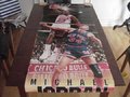 Picture: Very rare and vintage 6 foot tall Costacos Brothers Michael Jordan Chicago Bulls Poster. 26 X 72 inch poster bigger than life just like Jordan. This shows Michael over a quarter of a century ago in his classic tongue out dunk over New York's Kenny Walker. This is an original and very rare Michael Jordan six foot tall poster in very good shape with minor pin holes in the far bottom left corner but no tears. We only have one of this poster.
