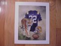 Picture: LSU Tigers original art print with uniform, tiger and helmet is 10 X 12 with an image area of 8 X 10. A great print for autographs!