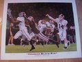 Picture: 2008 Alabama Crimson Tide "Crimson Black-Eye" large limited edition print signed and numbered by artist Alan Zuniga includes John Parker Wilson, Julio Jones, Terrence "Mount" Cody, and Rolando McClain. 22 X 28 print in excellent shape with no pin holes or tears.
