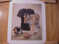 Picture: Missouri Tigers original art print with uniform, tiger and helmet is 10 X 12 with an image area of 8 X 10. A great print for autographs!
