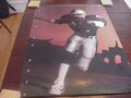 Picture: This is an original Ronnie Lott Los Angeles Raiders "Lotts of Pain" Nike full size 23 X 35 poster from 1991 in excellent shape with no pin holes or tears but miniscule wear in very bottom corners not touching image area. We only have one of this extremely rare poster!