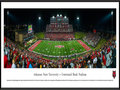 Picture: Just out from the 2015 season is a 13.5 X 40 panoramic poster professionally framed to 13.75 X 40.25 of the Arkansas State Red Wolves and Centennial Bank Stadium. This panorama features Arkansas State University football team playing their home opener and celebrating over 100 years of football at the recently renovated Centennial Bank Stadium. The stadium additions included a new and expanded press box, as a result of a surge of enthusiasm for the Red Wolves’ football program. They achieved remarkable success from 2011-2014, which included three conference championships, four bowl games and two 10-win seasons. This four year period resulted in 35 wins for A-State. Centennial Bank Stadium is located on the campus of Arkansas State University in Jonesboro, Arkansas.