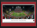 Picture: Just out from the 2015 season is a panoramic of the Arkansas State Red Wolves and Centennial Bank Stadium professionally double matted in team colors and framed to 18 X 44. This panorama features Arkansas State University football team playing their home opener and celebrating over 100 years of football at the recently renovated Centennial Bank Stadium. The stadium additions included a new and expanded press box, as a result of a surge of enthusiasm for the Red Wolves’ football program. They achieved remarkable success from 2011-2014, which included three conference championships, four bowl games and two 10-win seasons. This four year period resulted in 35 wins for A-State. Centennial Bank Stadium is located on the campus of Arkansas State University in Jonesboro, Arkansas.