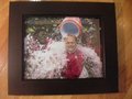 Picture: Mark Richt gets the Gatorade Shower after leading the Georgia Bulldogs in 2002 to their first SEC Championship under him 8 X 10 photo professionally framed in very nice black wood to 11 X 14.