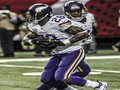 Picture: Adrian Peterson takes the handoff from Teddy Bridgewater of the Minnesota Vikings 16 X 20 poster. We are the copyright holders of this image.