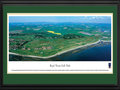Picture: This 13.5 X 40 aerial panoramic photograph of Royal Troon Golf Club has been professionally double matted and framed to 18 X 44. Royal Troon Golf Club, situated on the west coast of Scotland was formed in 1878 at a meeting of enthusiasts in Troon and quickly developed a reputation as a testing course. The Old Course, located in the foreground, is widely accepted as one of the most difficult courses in Scotland. With the wind and the deep rough interspersed with gorse and broom, accuracy is essential. The Portland Course, located in the distance, is a more sheltered par 71 course. The clubhouse is located at the far left of the panorama.