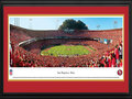 Picture: This 13.5 X 40 panorama of Candlestick Park, the previous home of the San Francisco 49ers, has been professionally double matted and framed to 18 X 44. It captures the excitement of a touchdown play and ultimate victory over a fierce co-conference opponent. As the first major league professional sports franchise to be based in San Francisco, the 49ers were part of the All-American Football Conference until merging with the NFL in 1950. Between 1988 and 1990, the 49ers set an amazing league record with 18 consecutive road victories. The 49ers were also the first NFL franchise to win back-to-back Super Bowls under different head coaches. From the NFL Stadiums collection.