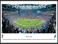 Picture: This panorama of the Detroit Lions NFL football team playing at Ford Field has been professionally framed to 13.75 X 40.25. The team started in 1929 as the Portsmouth Spartans, joined the NFL in 1930 and became the Detroit Lions in 1934. The Lions played at the University of Detroit Stadium for four years and then moved to Briggs Stadium (later named Tiger Stadium) in 1938. In 1975, the Lions moved to the Pontiac Silverdome, where they played until moving to Ford Field in 2002. The Lions' history includes NFL Championships, several enshrinees in the Pro Football Hall of Fame and one of America's best holiday traditions – Detroit's annual Thanksgiving Day Classic. From the NFL Stadiums collection.